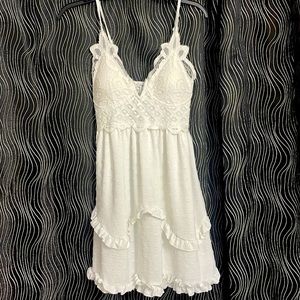 White sundress. Sleeveless bohemian style